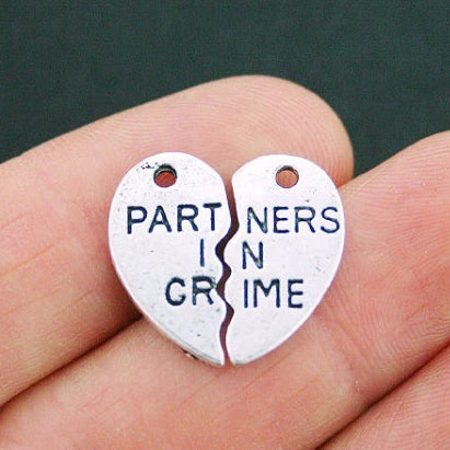 2 Partners in Crime Antique Silver Tone Charms - SC1296