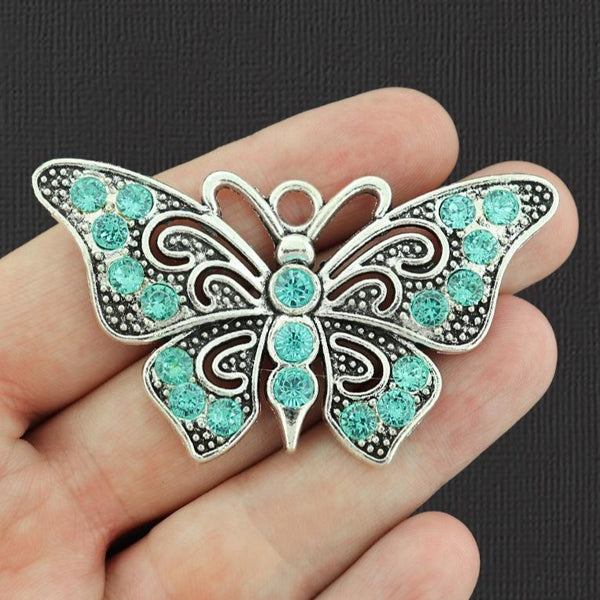 Breloque papillon ton argent antique avec strass incrustés - SC6472