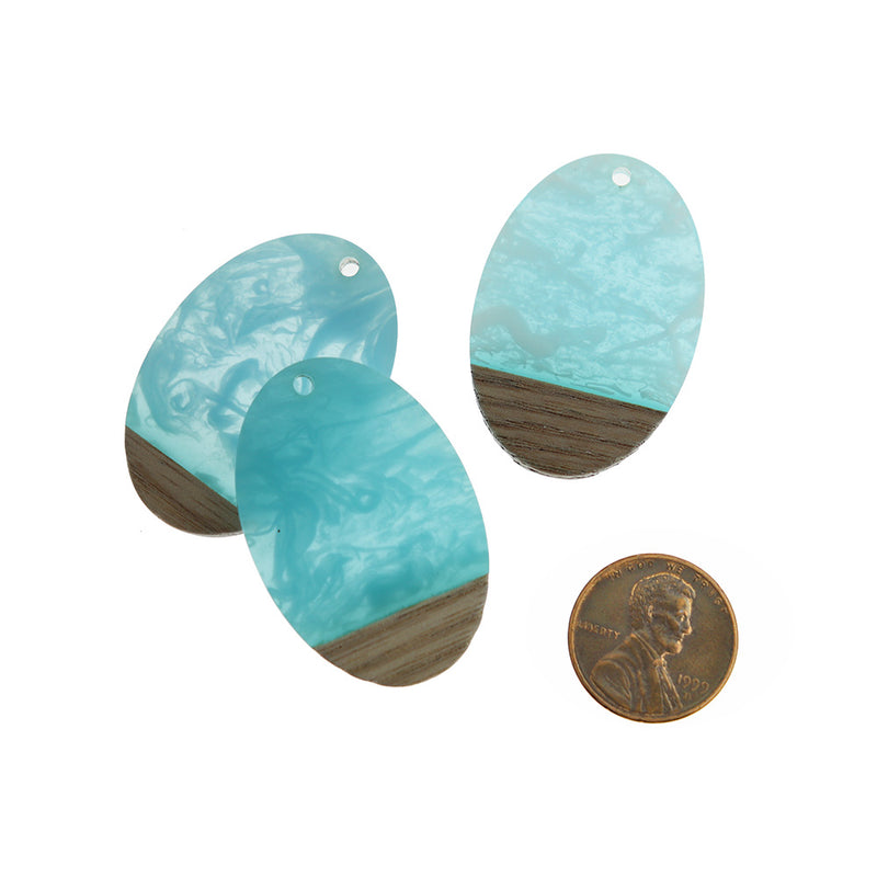 2 Oval Natural Wood and Turquoise Swirled Resin Charms 38mm - WP489
