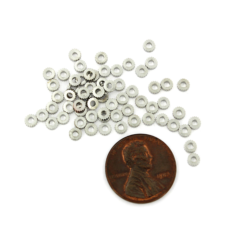 Perles d'espacement Gear 3,5 mm x 1,3 mm - ton argent - 50 perles - SC5272