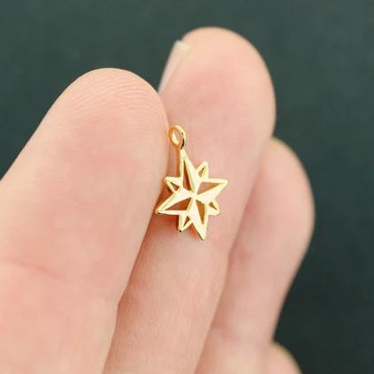 Charm étoile boussole doré - GC1041
