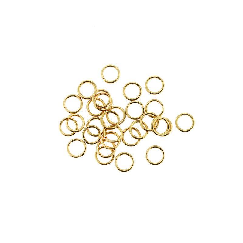 Anneaux en acier inoxydable doré 7 mm x 1 mm - Calibre 18 ouvert - 20 anneaux - J196