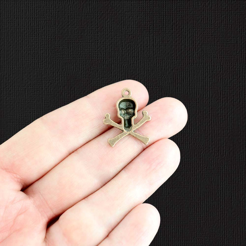 10 Skull and Crossbones Antique Bronze Tone Charms - BC858
