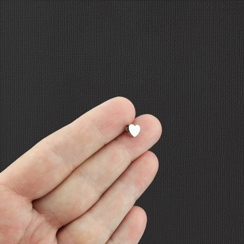 Perles intercalaires coeur en acier inoxydable 7 mm x 6 mm - ton argent - 2 perles - MT746