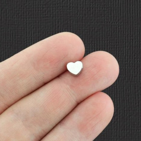 Perles intercalaires coeur en acier inoxydable 7 mm x 6 mm - ton argent - 2 perles - MT746