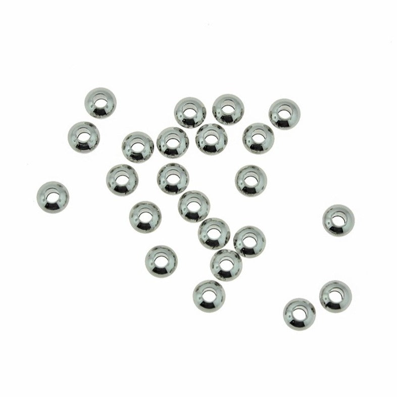Perles d'espacement en acier inoxydable Rondelle 4 mm x 2,5 mm - ton argent - 20 perles - MT757