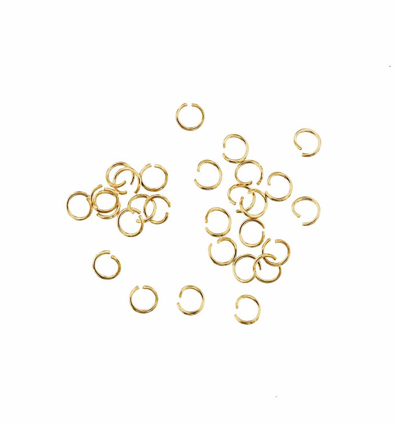 Anneaux en acier inoxydable doré 3 mm - Calibre 26 ouvert - 300 anneaux - J156