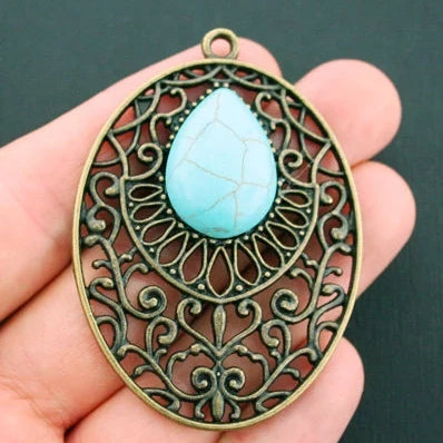 Filigree Antique Bronze Tone Charm With Imitation Turquoise - BC097