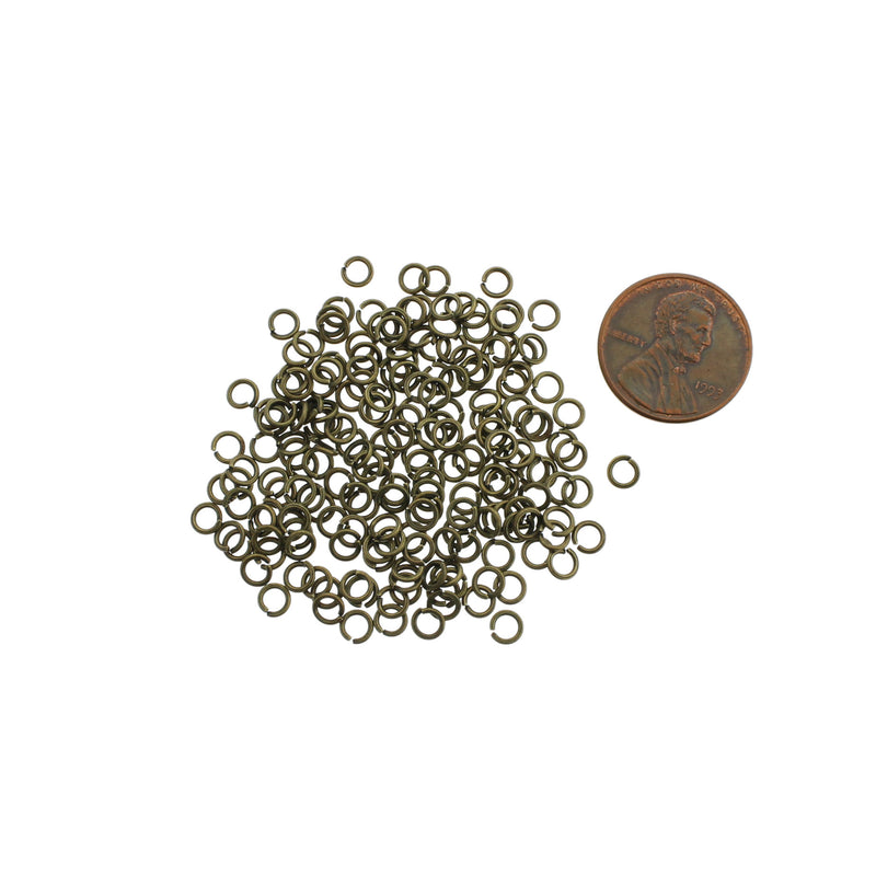 Anneaux de jonction en bronze antique 4 mm x 0,7 mm - Calibre 21 ouvert - 1000 anneaux - J098