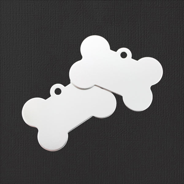 Ébauches d'estampage d'os de chien - Aluminium argenté - 25 mm x 38 mm - 4 étiquettes - FD766