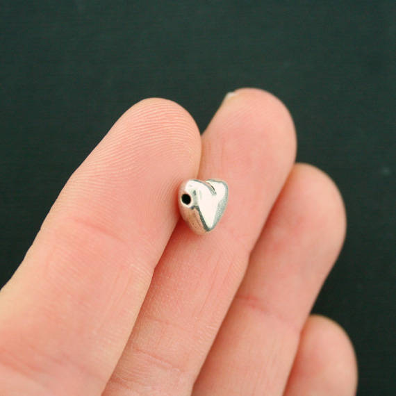 Perles d'espacement de coeur 10 mm x 9 mm - ton argent - 60 perles - SC7482