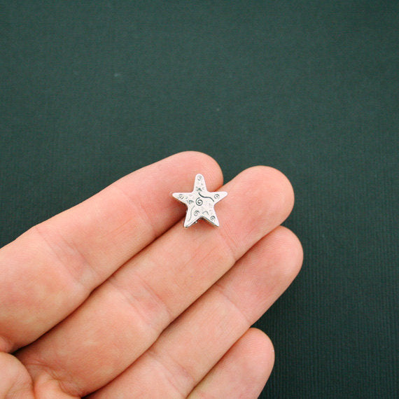 Perles intercalaires étoiles 14 mm - ton argent - 8 perles - SC5797