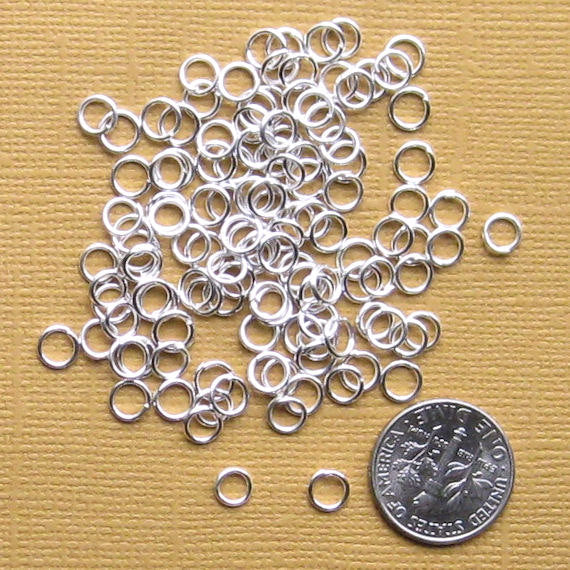Anneaux argentés 5 mm x 0,8 mm - Calibre 20 ouvert - 1000 anneaux - J029