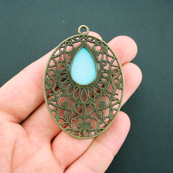 Filigree Antique Bronze Tone Charm With Imitation Turquoise - BC097