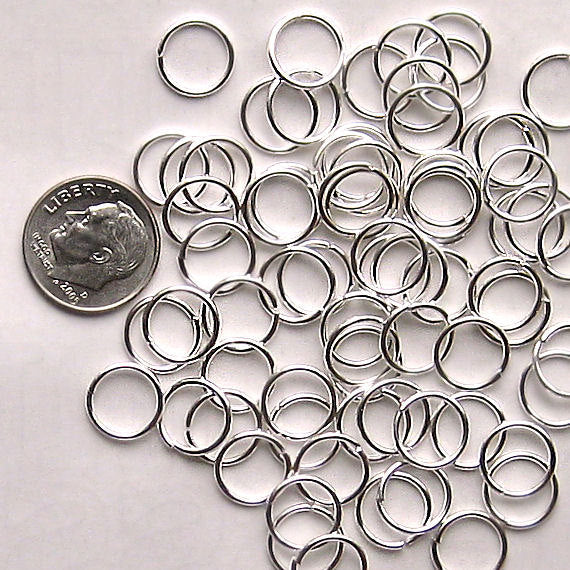 Anneaux argentés 10 mm x 1,2 mm - Calibre 16 ouvert - 200 anneaux - J049