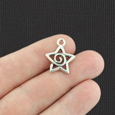 10 Swirl Star Antique Silver Tone Charms - SC1026