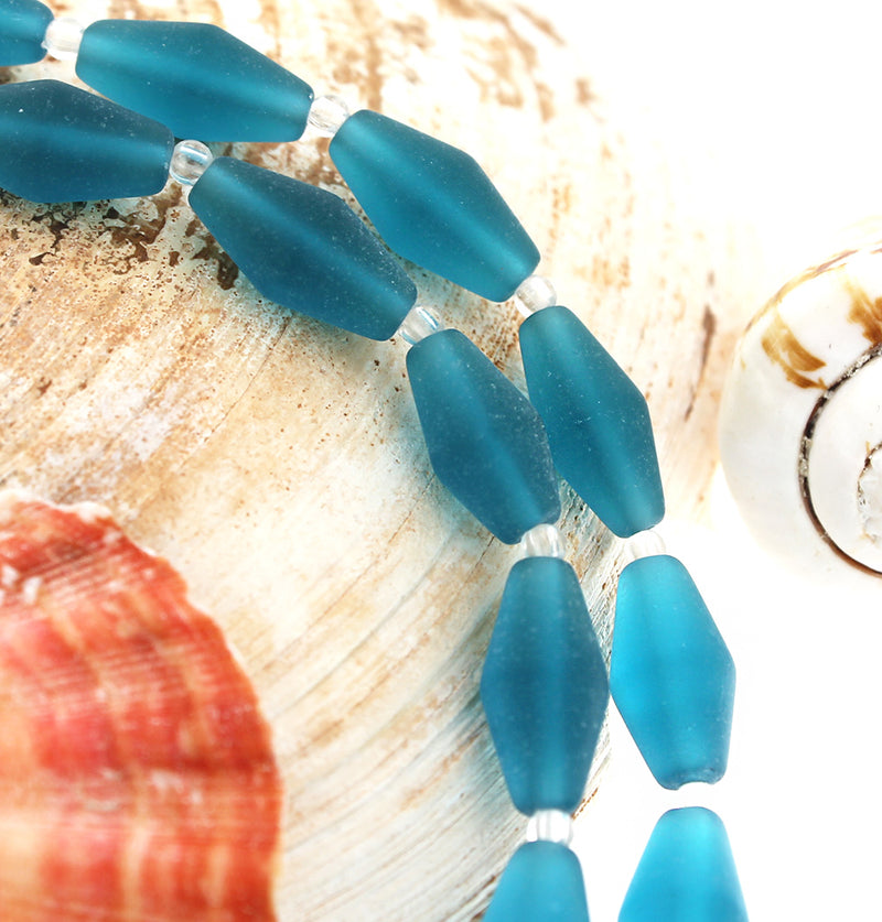 Perles de verre de mer de culture toupies 17 mm x 8 mm - Sarcelle givrée - 1 brin 11 perles - U153