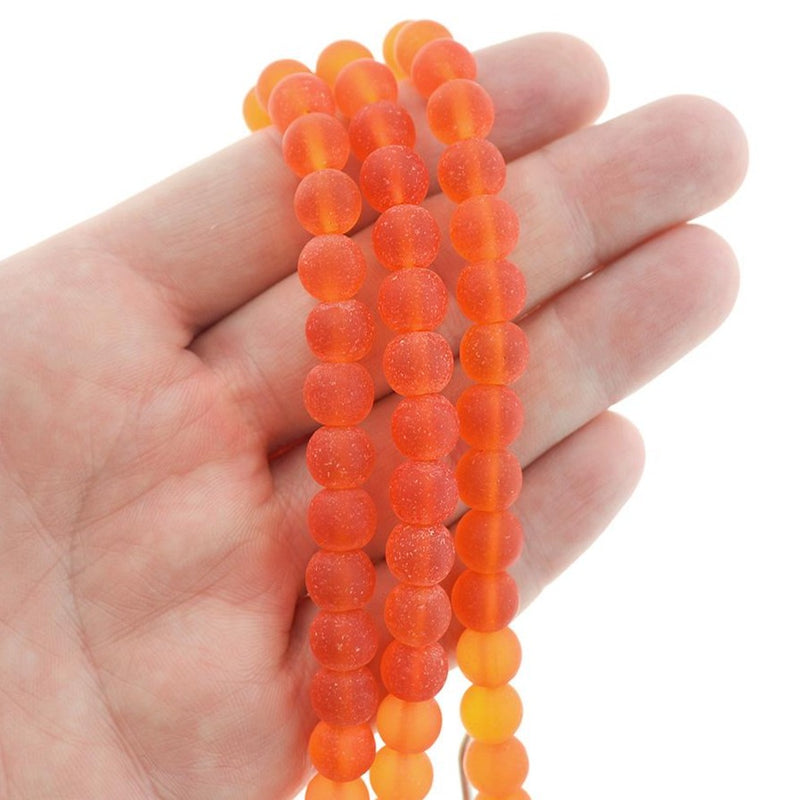 Perles rondes en verre de mer de culture 8 mm - Orange givré - 1 rang 24 perles - U202