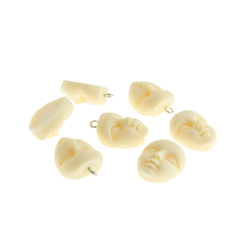 4 Doll Face Resin Charms - K557