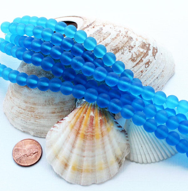 Perles rondes en verre de mer de culture 8 mm - Bleu givré - 1 rang 26 perles - U087