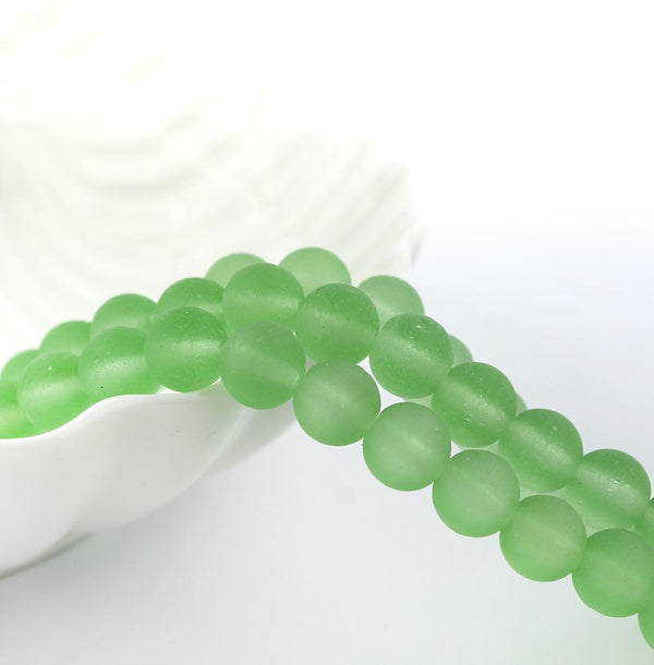 Perles rondes en verre de mer de culture 8 mm - Vert givré - 1 rang 24 perles - U125