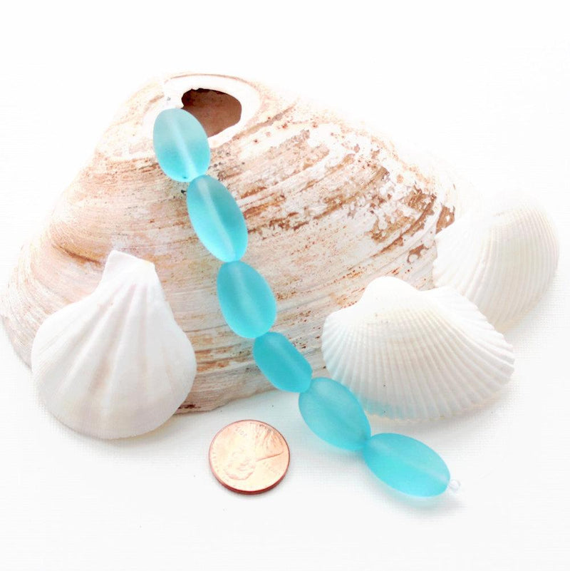 Perles en verre de mer de culture pépite 18 mm x 22 mm - bleu clair givré - 1 rang 6 perles - U096